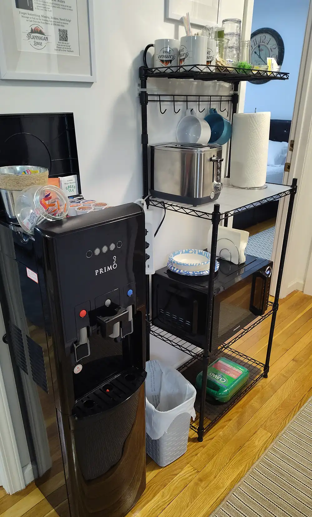 The Coffee and Snack Station at Flannagan Lodge with mini-fridge, microwave, toaster, K-Cup coffee maker and Primo water dispenser